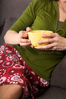 yellow bowl in woman hands