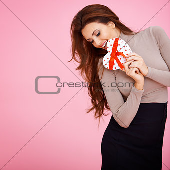 Sentimental woman with a Valentine gift