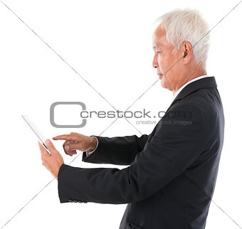 Asian Chinese boss using tablet computer