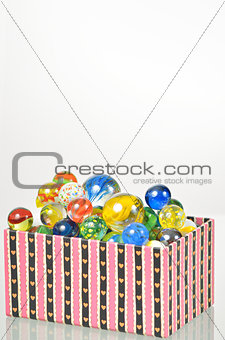 marbles balls in box