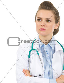 Portrait of medical doctor woman looking on copy space