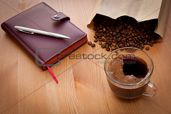 cup of coffee and coffee  beans