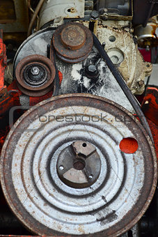 Closeup of old snowblower motor pulley