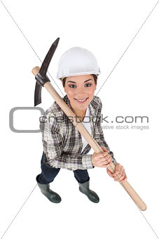 craftswoman holding a pickaxe