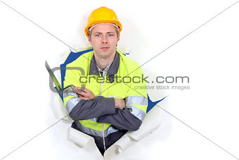 Tradesman with his arms crossed
