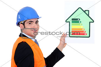 businessman holding an energy consumption label