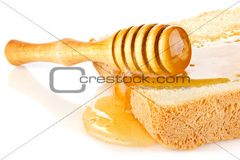 honey on bread slice with dipper