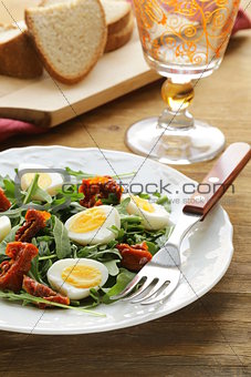salad with sun dried tomato and quail eggs