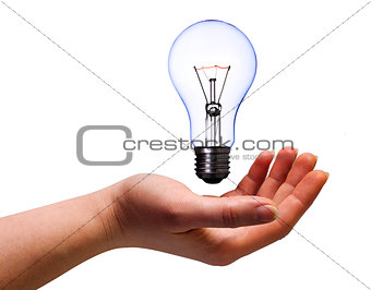 hand with lamp bulb