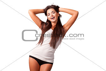 Attractive young woman in a white t-shirt on white background