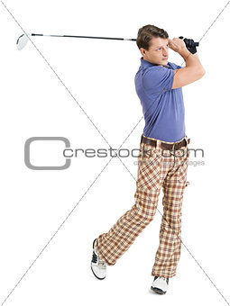 Male golfer swinging his club