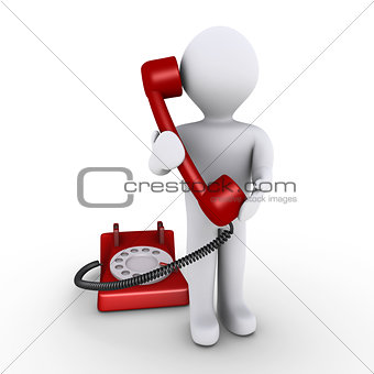 Person is holding telephone receiver