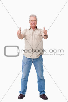 Mature male giving thumbs up