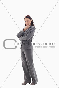 Profile of businesswoman with the hand on her chin
