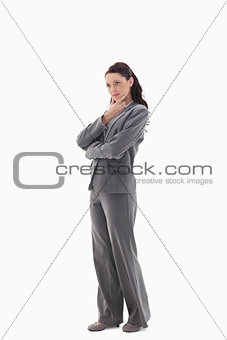 Profile of a businesswoman with the hand on her chin 