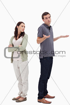 Man shrugged his shoulders back to back with angry woman