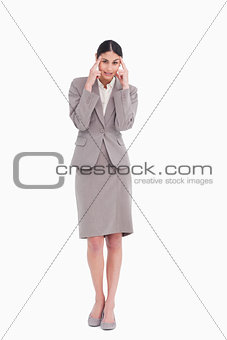 Businesswoman rubbing her temples