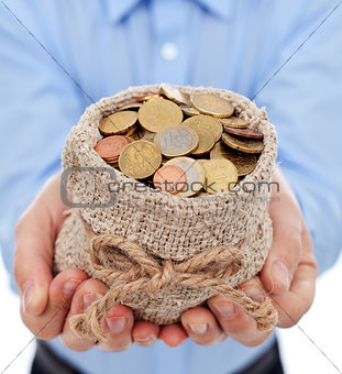 Man hands holding money bag with euro coins