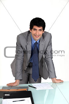 Executive hands resting on table