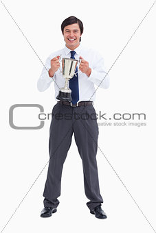 Smiling tradesman holding cup