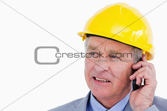 Close up of mature architect on the phone