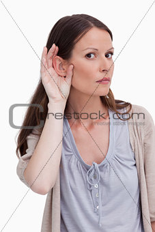 Close up of woman listening closely