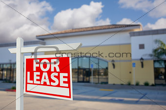 Vacant Retail Building with For Lease Real Estate Sign