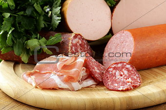 Assorted variety of sausages on a cutting board