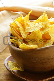 corn tortilla chips in a wooden bowl