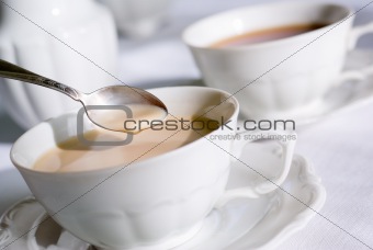 Teaspoon over cup of tea or coffee