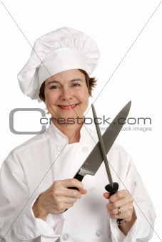 Friendly Chef Sharpens Knife