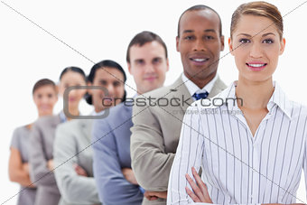 Close-up of a business team crossing their arms in a single line