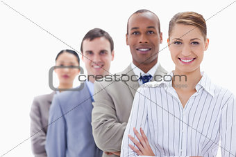 Close-up of a business team smiling in a single line