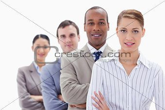 Close-up of colleagues in a single line crossing their arms