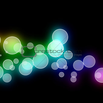 Multicolored blurred circles melding together