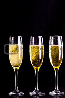 Three full glasses of champagne