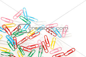 Many paper clips laid out together