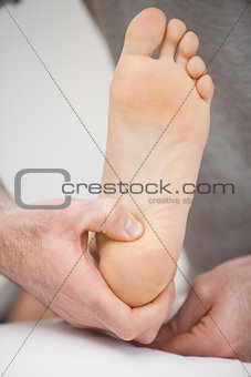 Foot being raised by a chiropodist