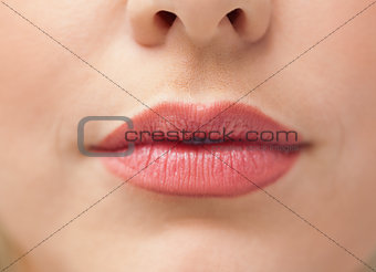 Close-up of lips with lipstick on them