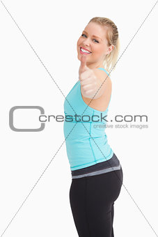 Woman with a thumb up