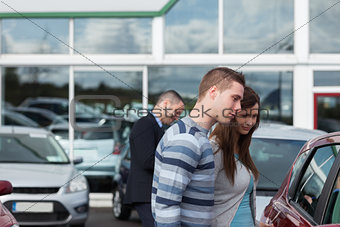 People buying a car