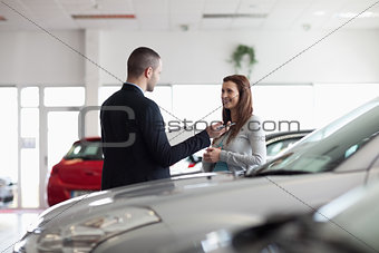 Dealer speaking with a client