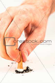 Hand extinguished a cigarette