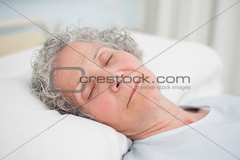 Patient sleeping on a medical bed