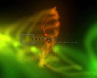 Blurred form of green and orange lights