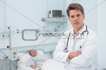 Doctor standing with crossed arms