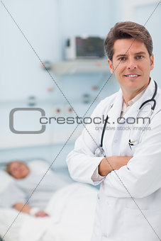 Doctor looking at camera with crossed arms