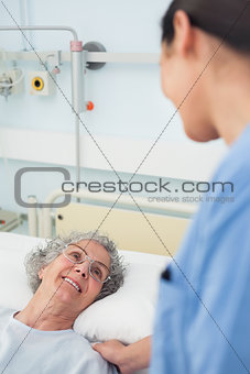 Patient smiling to a nurse