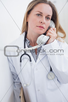 Doctor holding a phone