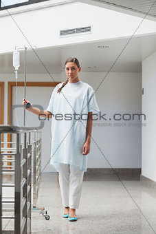 Patient walking with a drip stand
